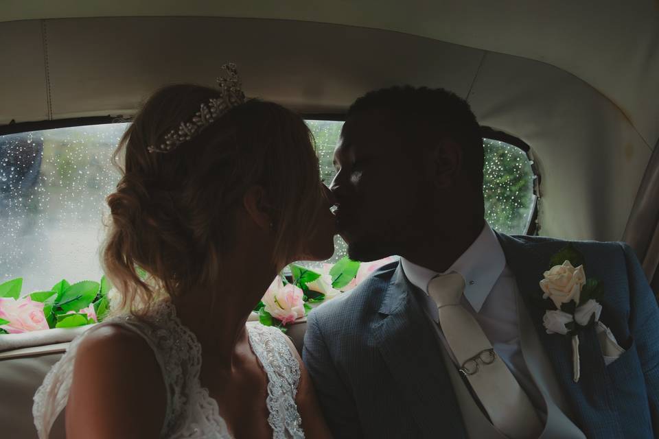 Kiss in the car after ceremony