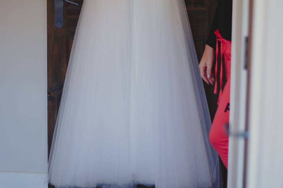 Wedding dress hanging up