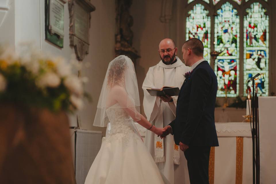 Bride and groom take vows