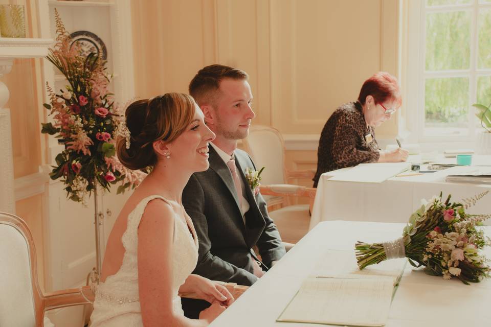 Bride and groom pose for photo