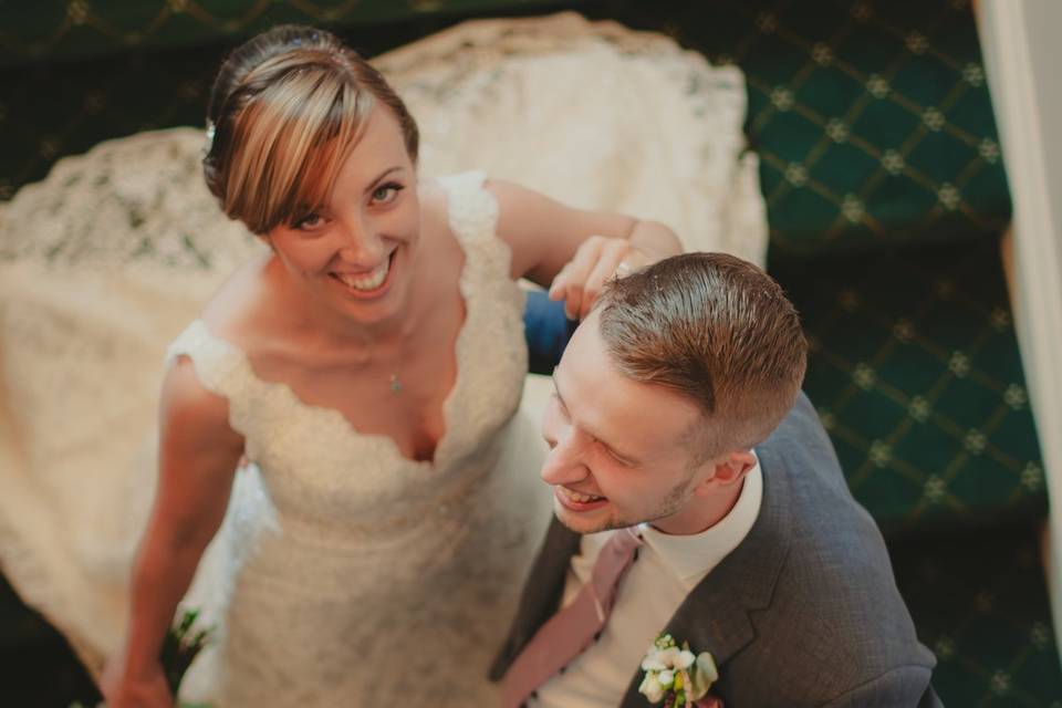 Bride and groom on stairs