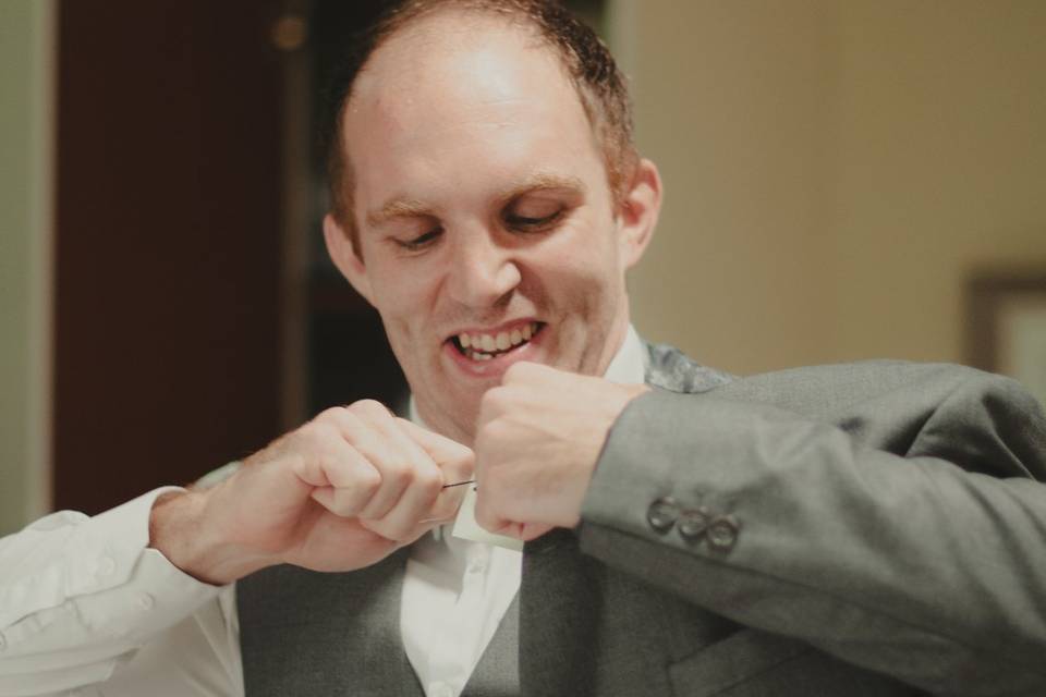 Groom removes tag