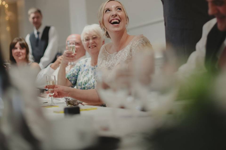 Bride laughs at speeches