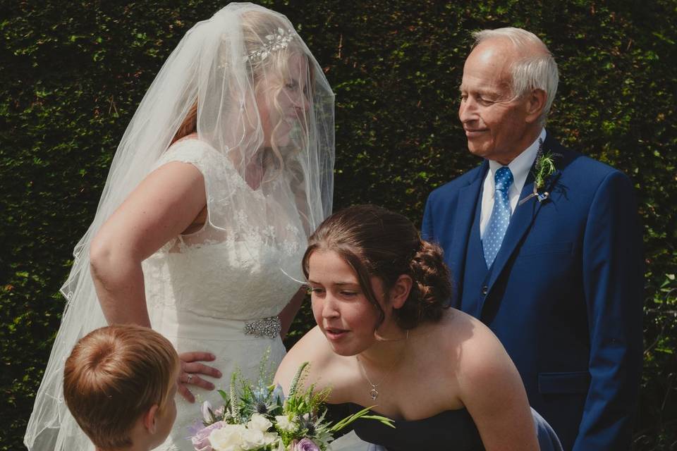 Bride preps to walk down aisle