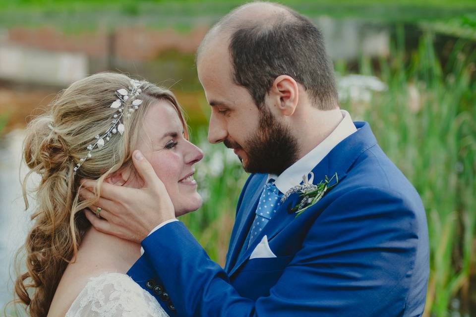 Bride and groom embrace