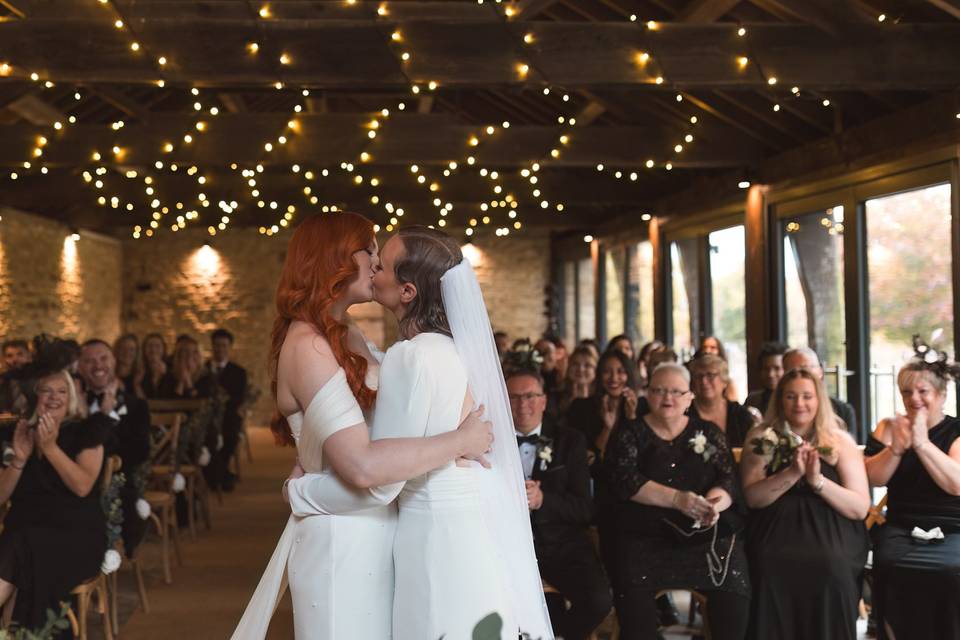 Romantic wedding ceremony kiss