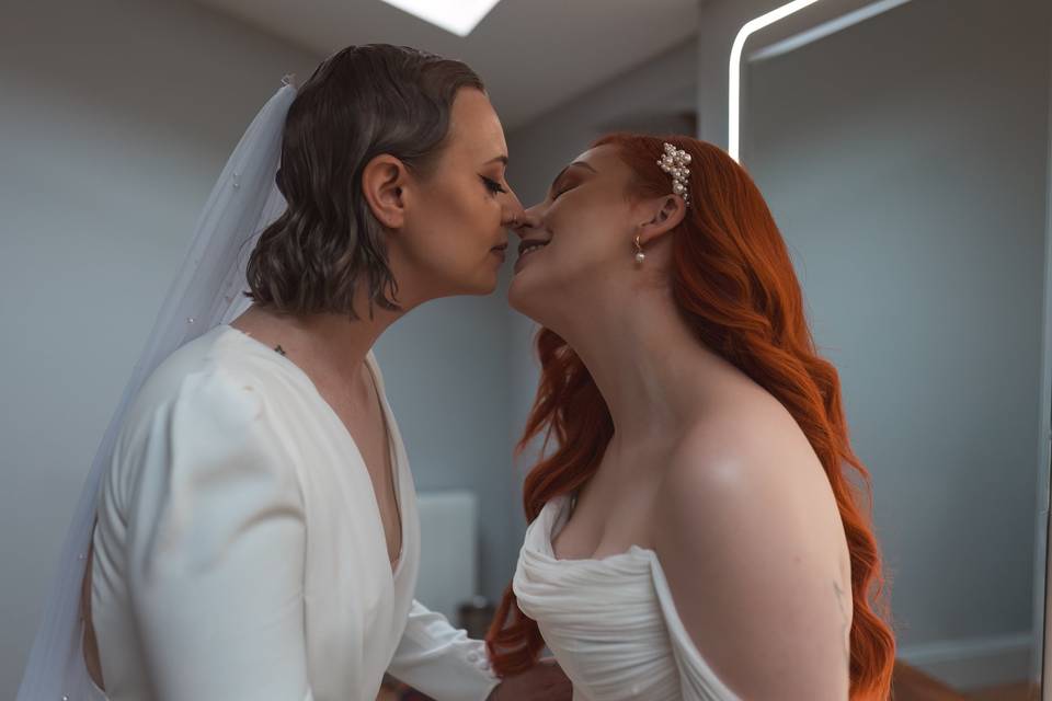 Intimate bridal kiss portrait
