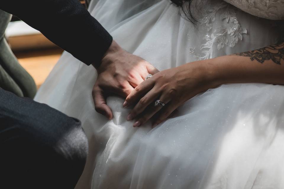 Bride and Groom Holding Hands
