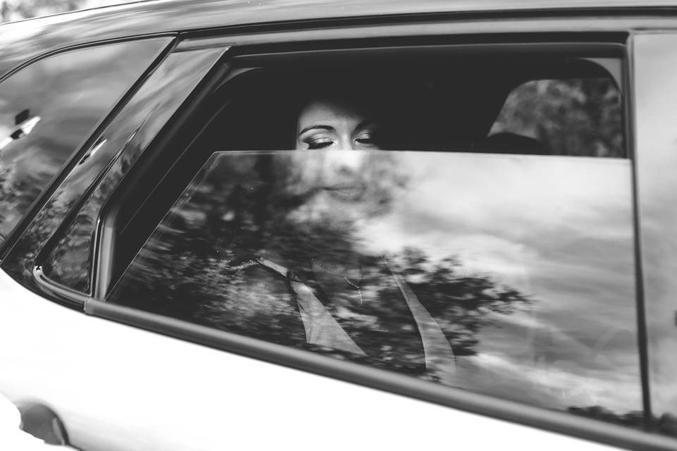 Bride in Car Reflection