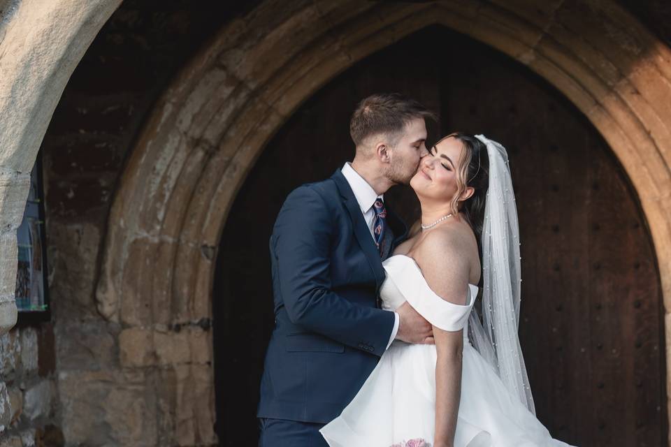 Couple under the arch