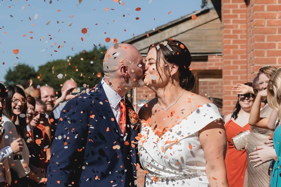 Bride and Groom Confetti Kiss