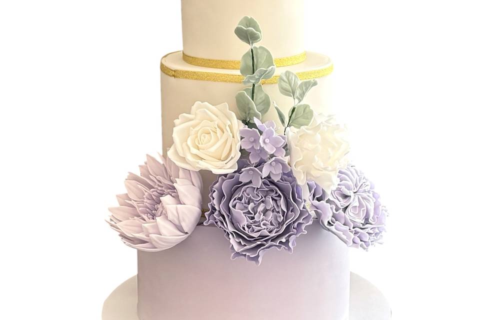 Lilac/white icing, sugar flowe