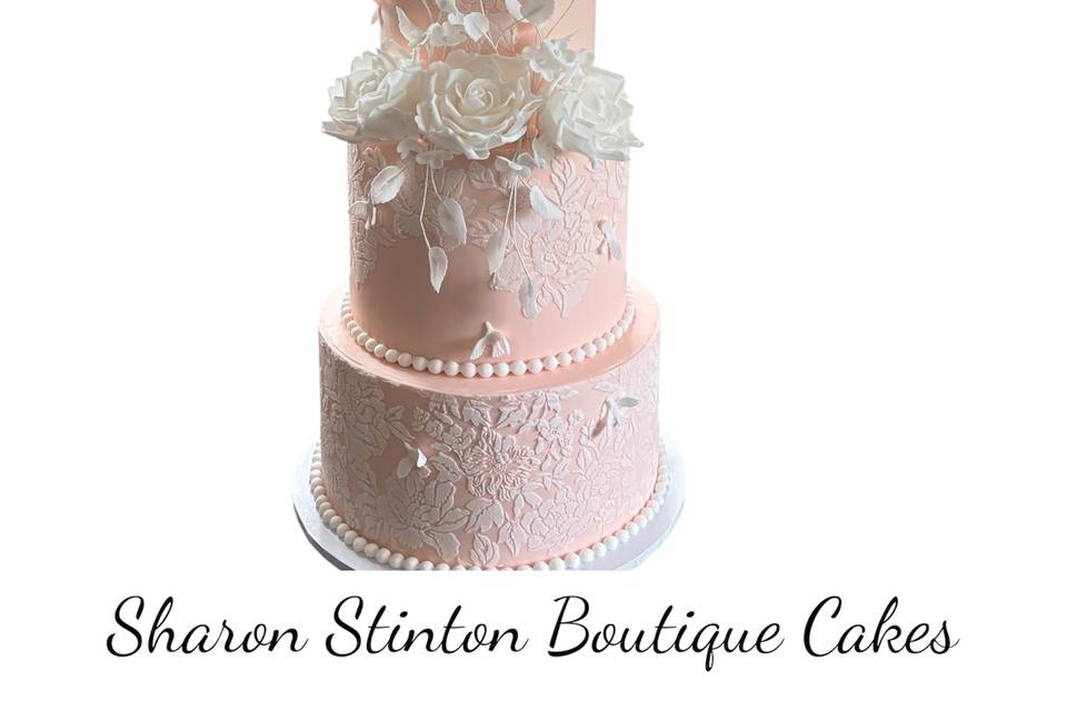 pink/peach icing, sugar flowe