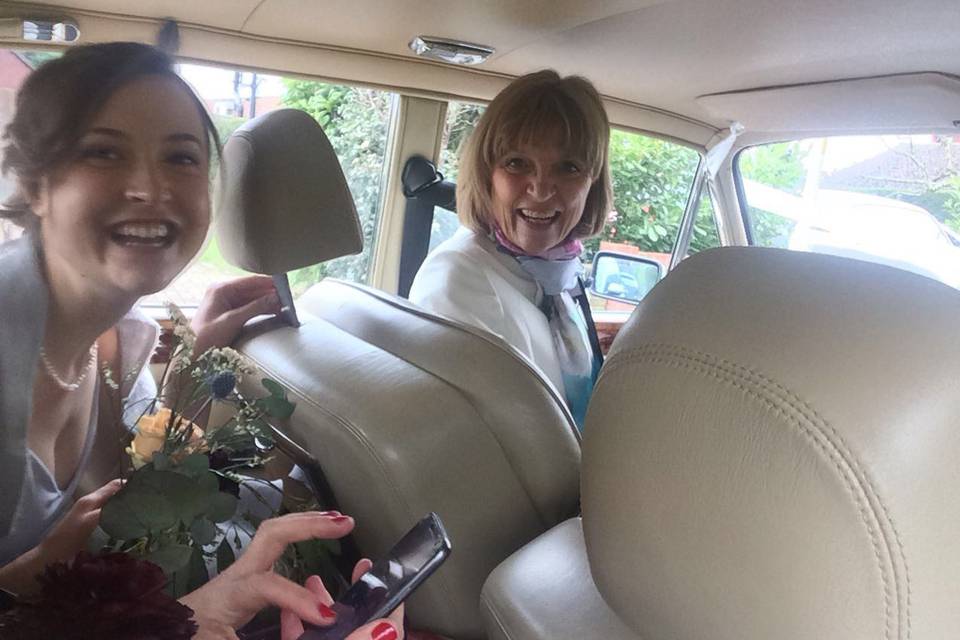 Happy bride's mum and bridesmaid