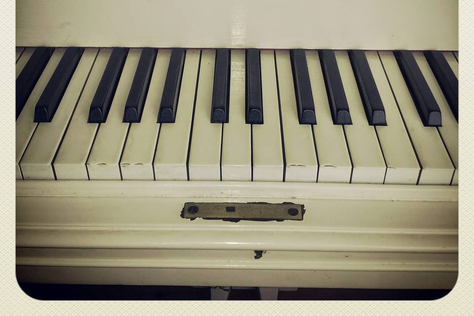 White Grand Piano