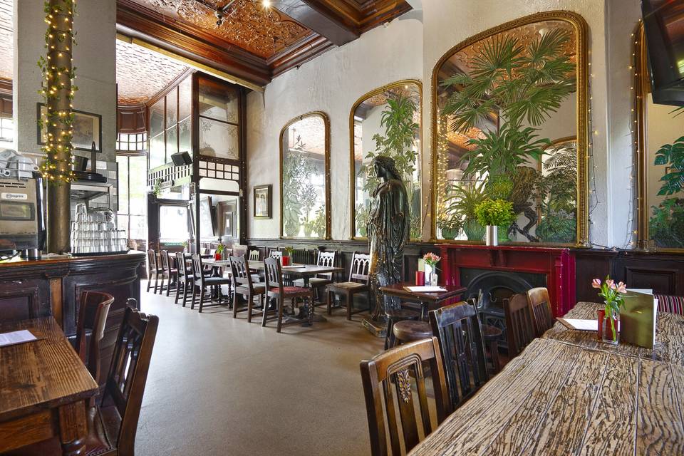 Large gold mirrors adorning walls