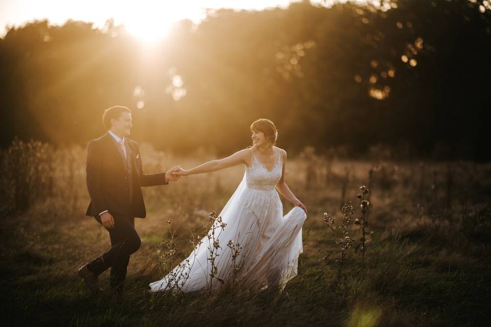 Walking in a field - Blue Lily Weddings