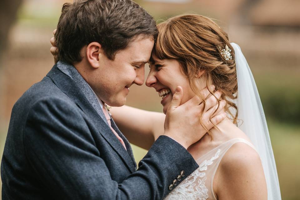 Couple smiling - Blue Lily Weddings