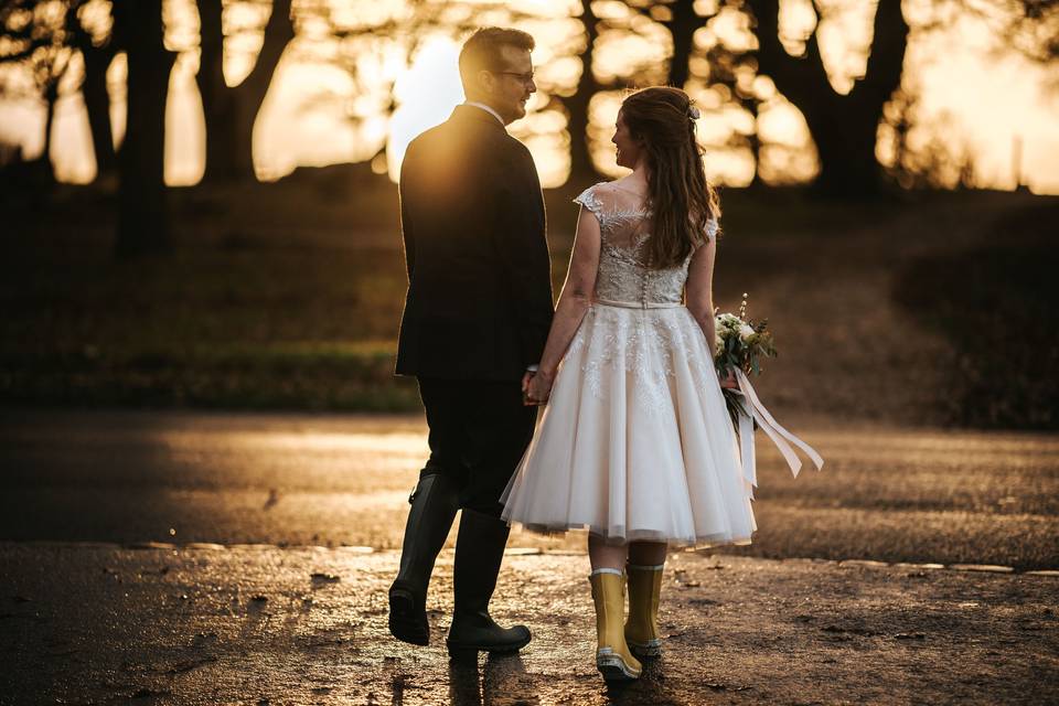 Couple holding hands - Blue Lily Weddings