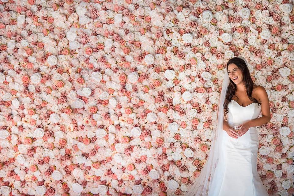 Bride and flower wall