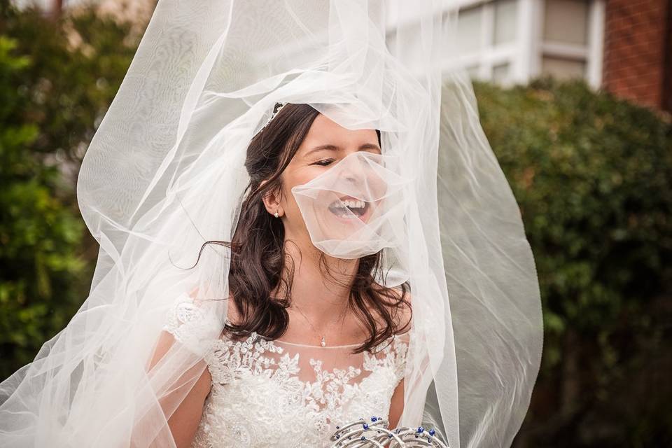 Happy bride in the wind