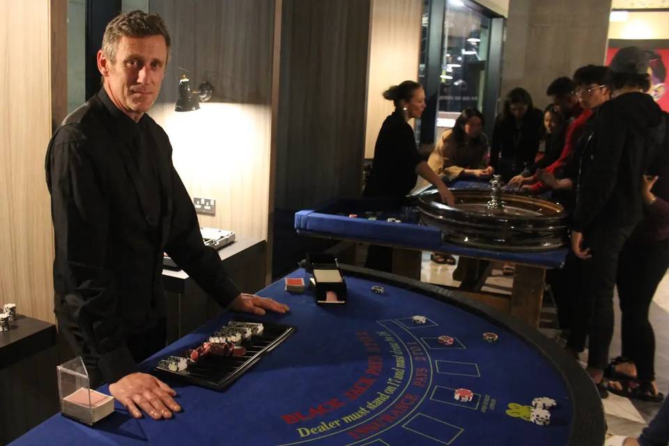 Blackjack table and croupier