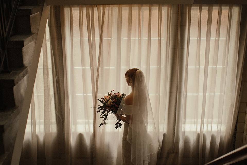 Silhouette bride in the stairs