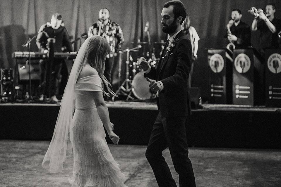 Couple dancing with live band