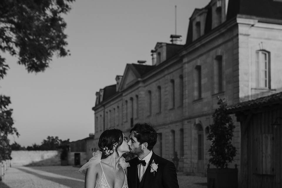 Couple kissing while walking