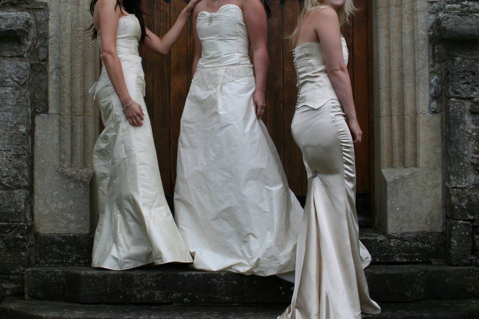 Three brides in handmade gowns