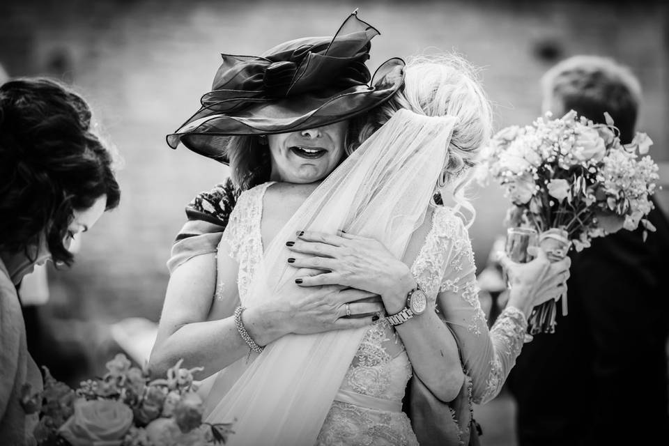 Hugging the bride moment