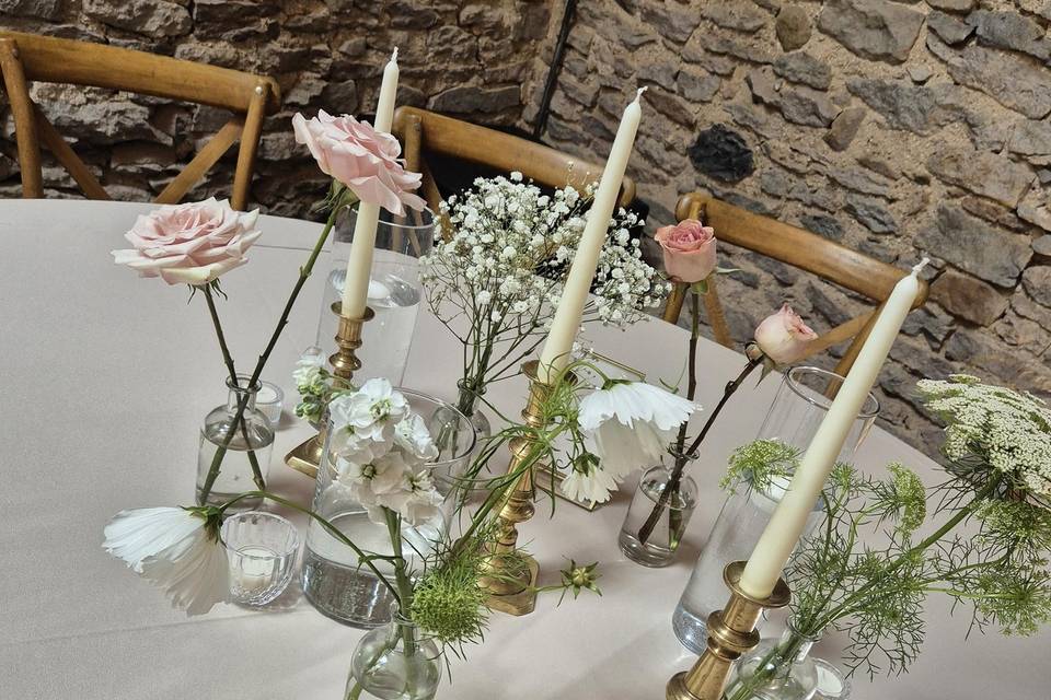 Table bud vases with candles