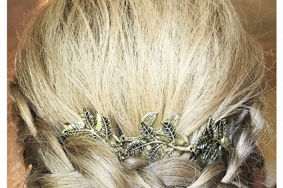 Braided updo with hair accessory