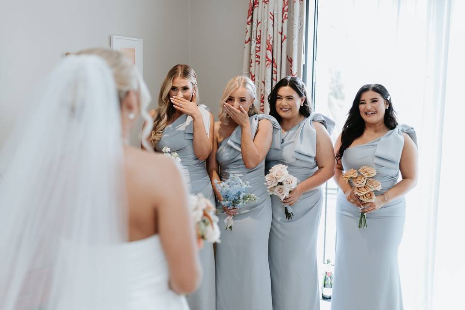Bridal reveal with bridesmaid