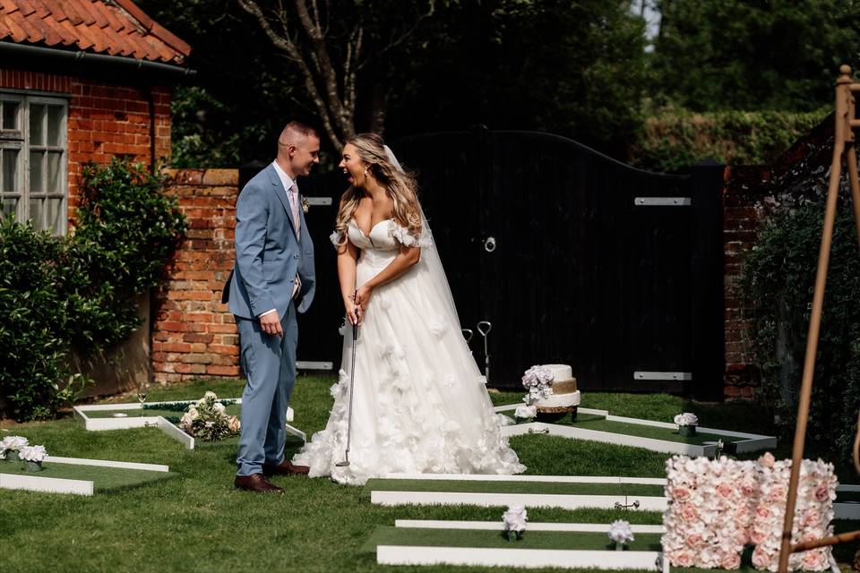 Bride and groom playing
