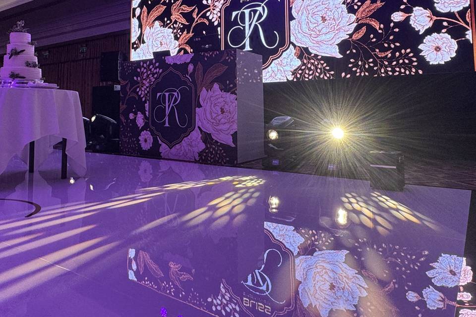 Floral purple lit stage