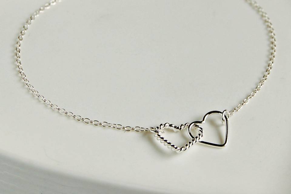 Silver linked hearts bracelet