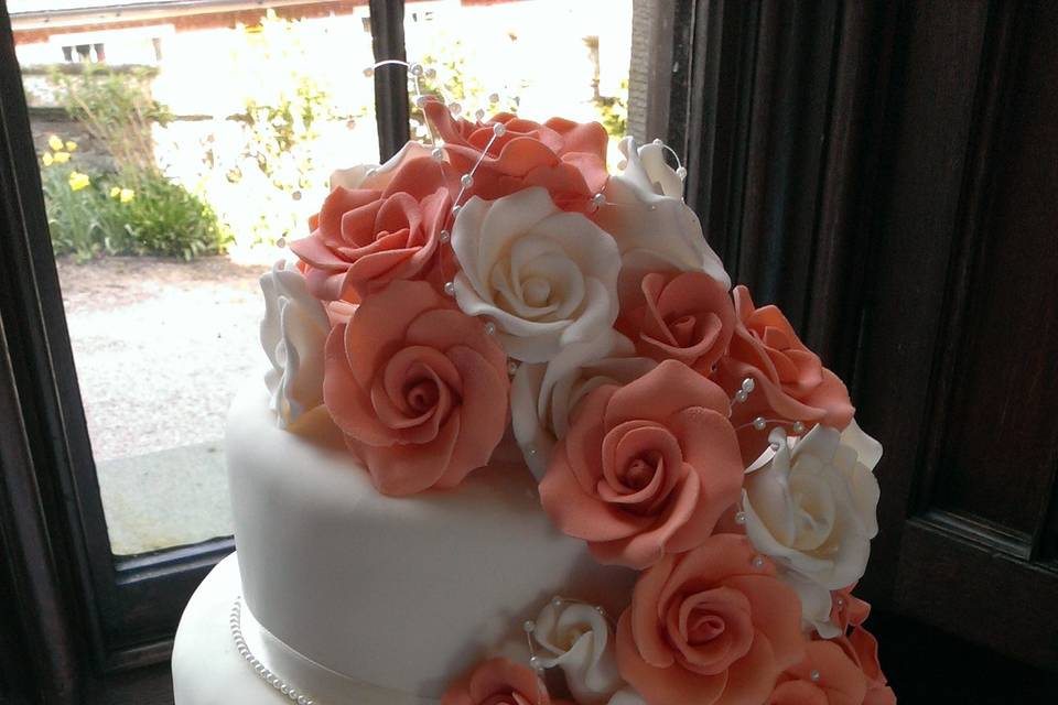 Coral and ivory rose cascade