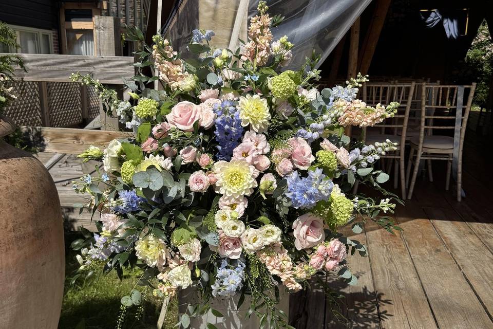 Rustic pastels milk churn