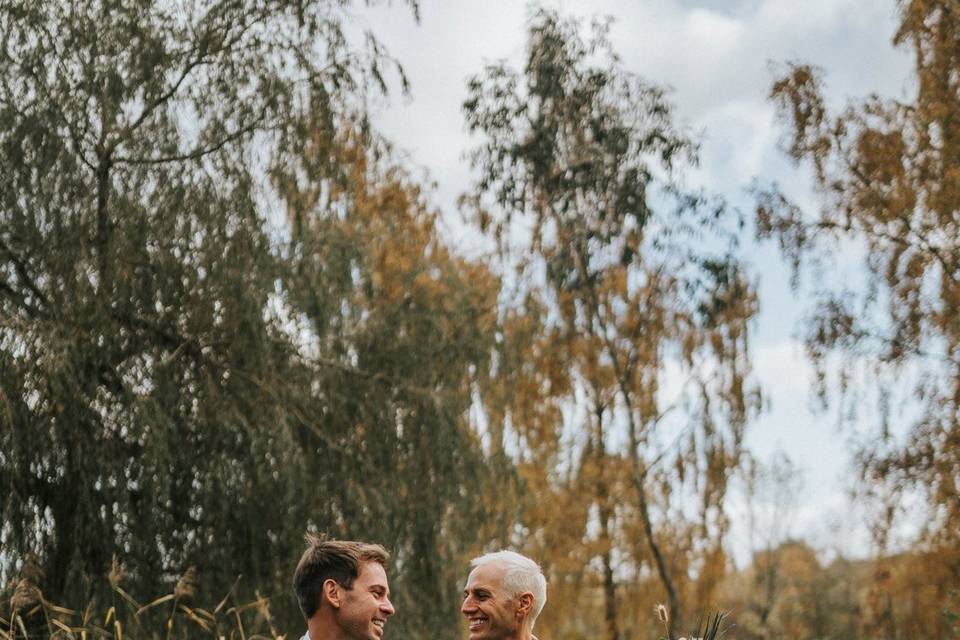 Two grooms at their wedding