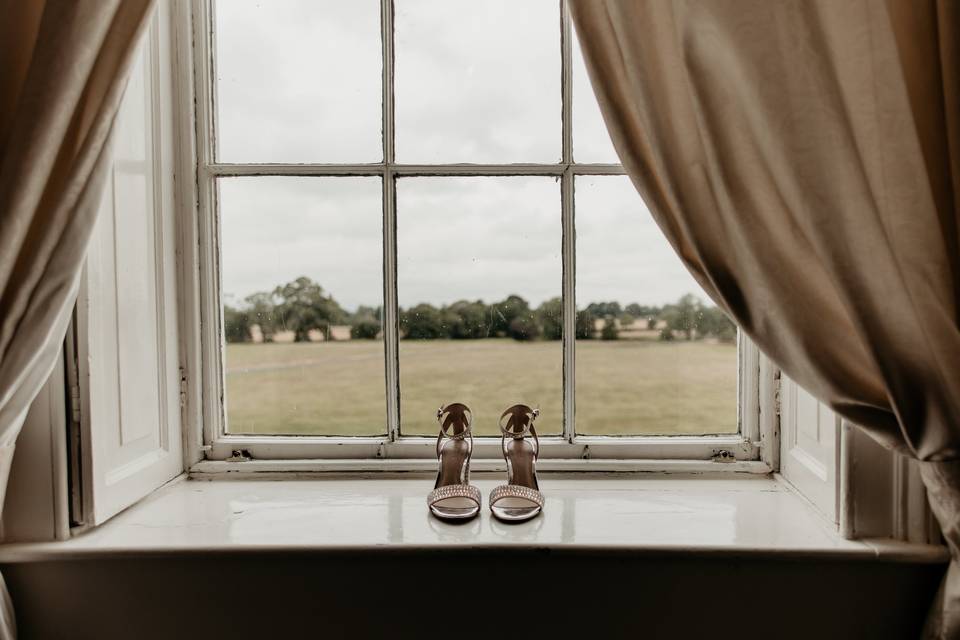 Shoes by window