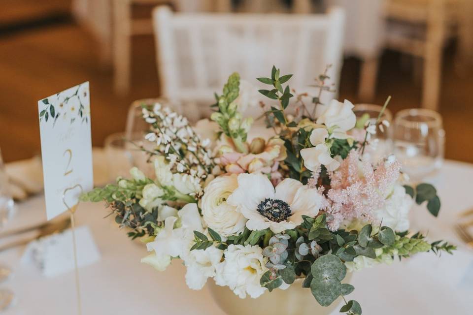 Gold footed bowl table flowers