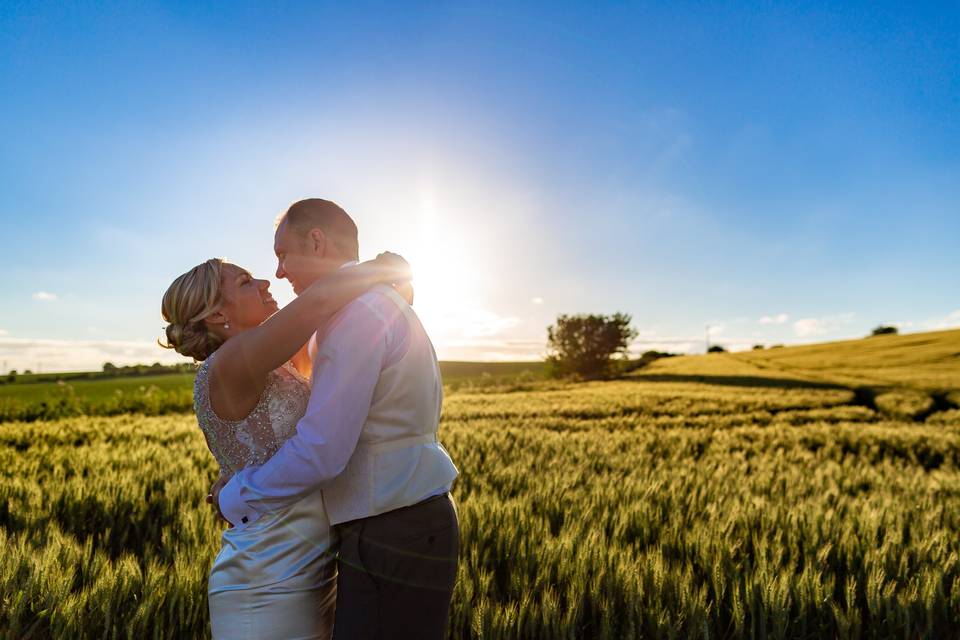 Couple in a field - David Cullimore Photography