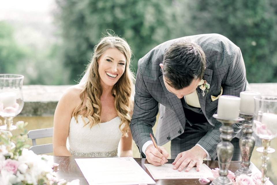 Signing the marriage paperwork