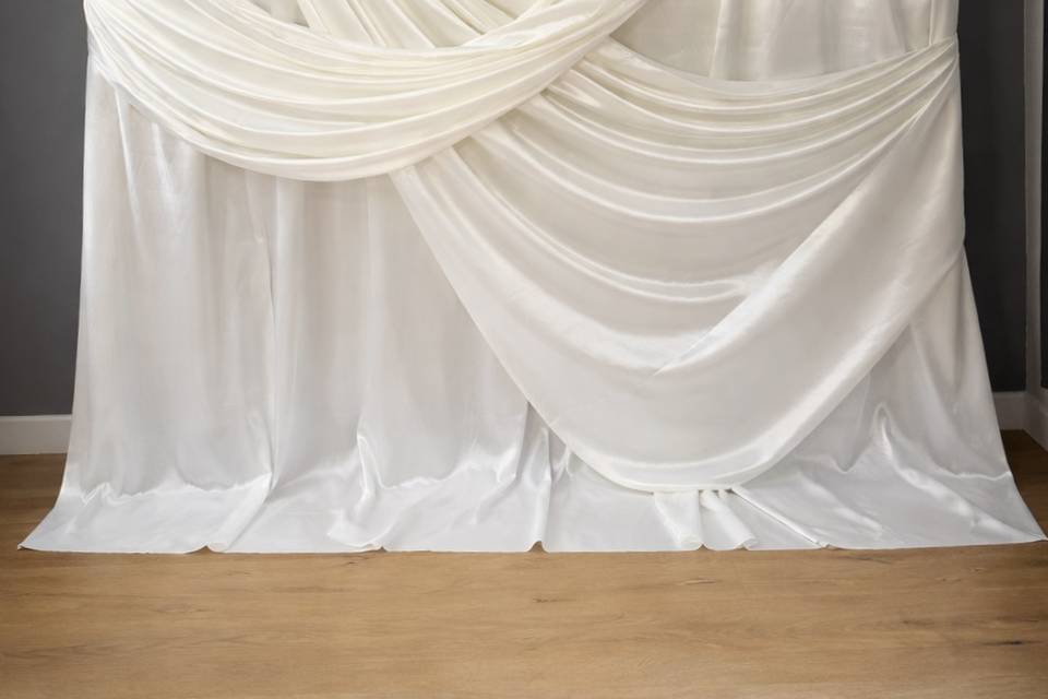 A timeless draped backdrop
