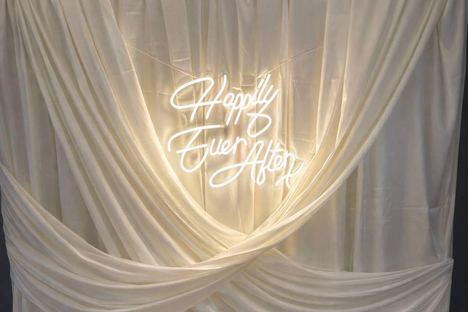 Draped backdrop with signage