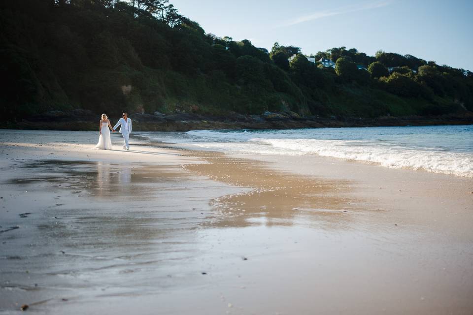 Walking Along A Golden Beach