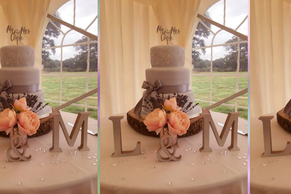 A blue, three-tiered cake