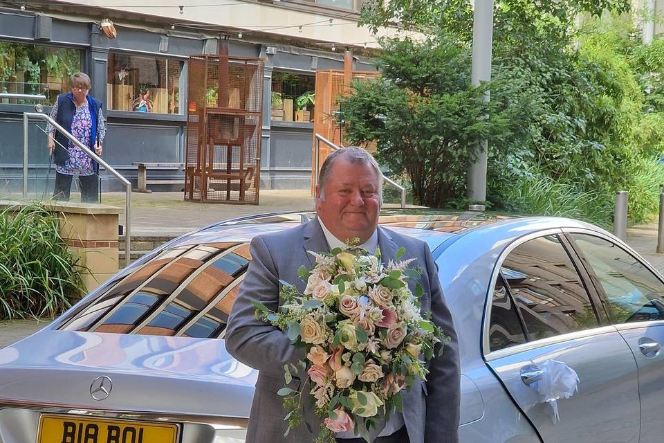 Chauffeur and bouquet