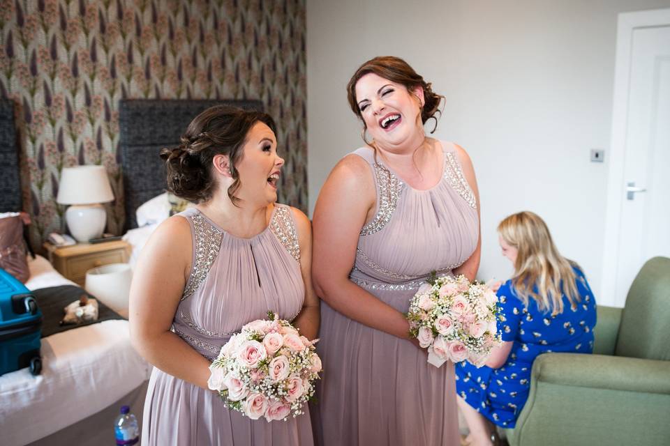 Bridesmaids laughing